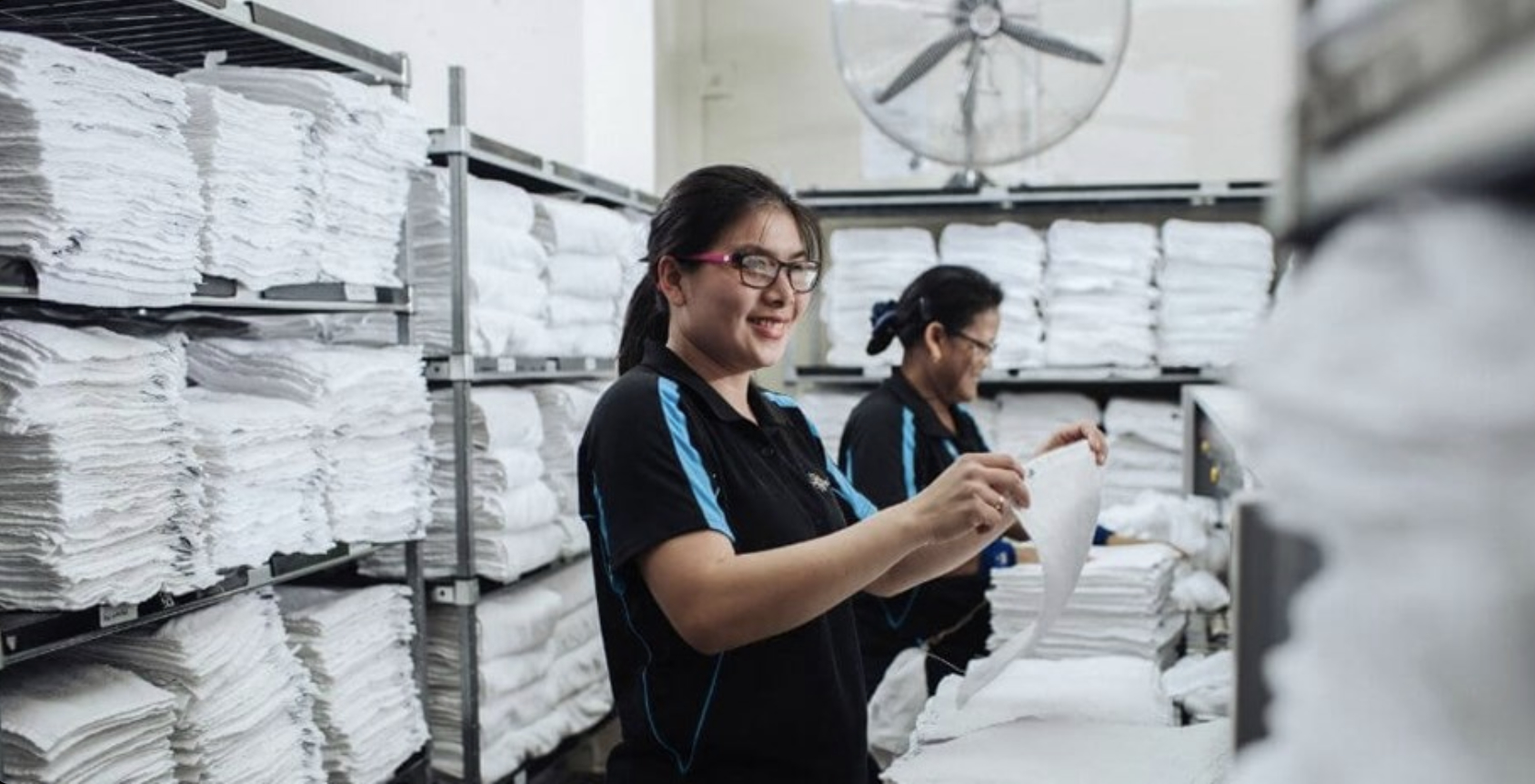 Super Laundry & Linens staff